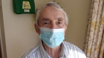 Thoughtful Glenrothes care home Resident wears a mask to protect staff